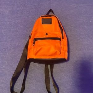 Small orange Steve Madden backpack
